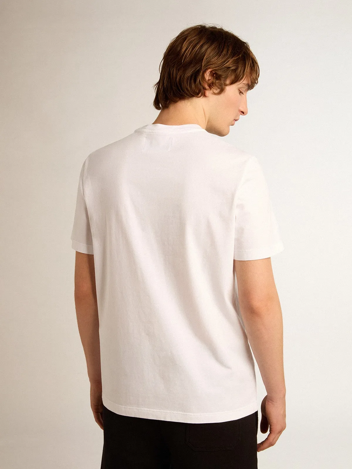 Camiseta blanca con estrella de purpurina plateada para hombre