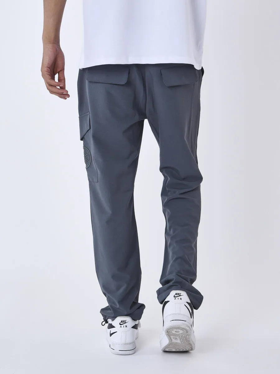 project x paris pantalon parachute cargo con bolsillo asimétrico con solapa - Gris